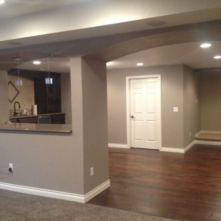 finished basement split hardwood floor and carpet