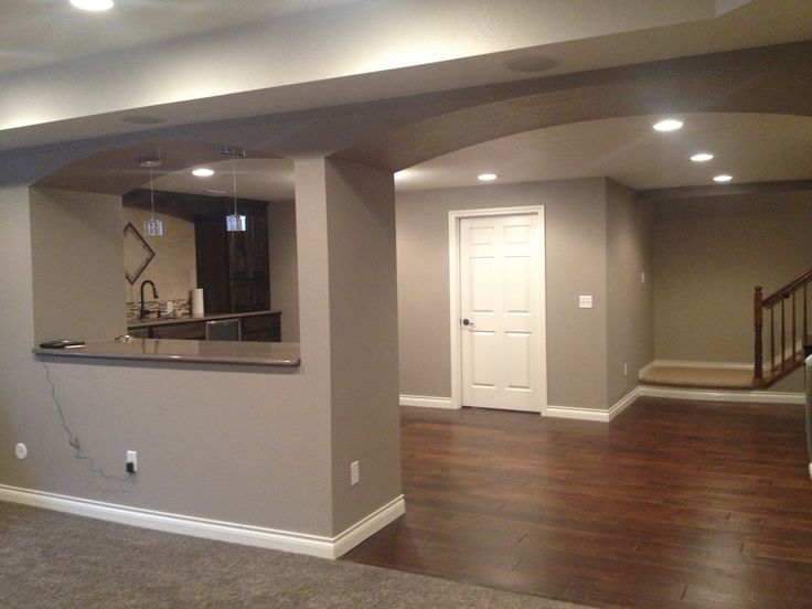 finished basement split hardwood floor and carpet