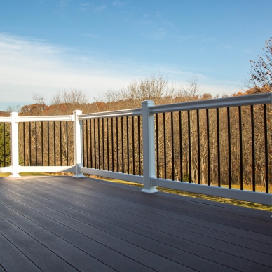 nonemaker - deck with vinyl railings off of 4-season room