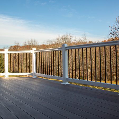 nonemaker - deck with vinyl railings off of 4-season room