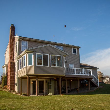 patio enclosure, deck and vinyl railings