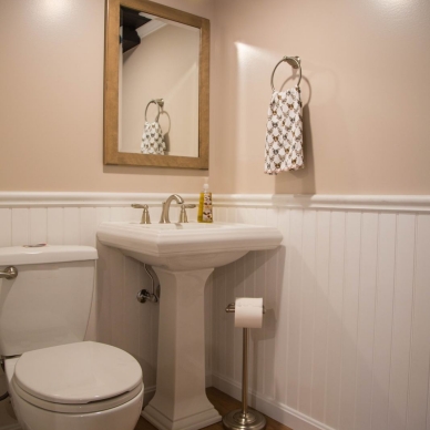 remodeled bathroom with pedestal sink