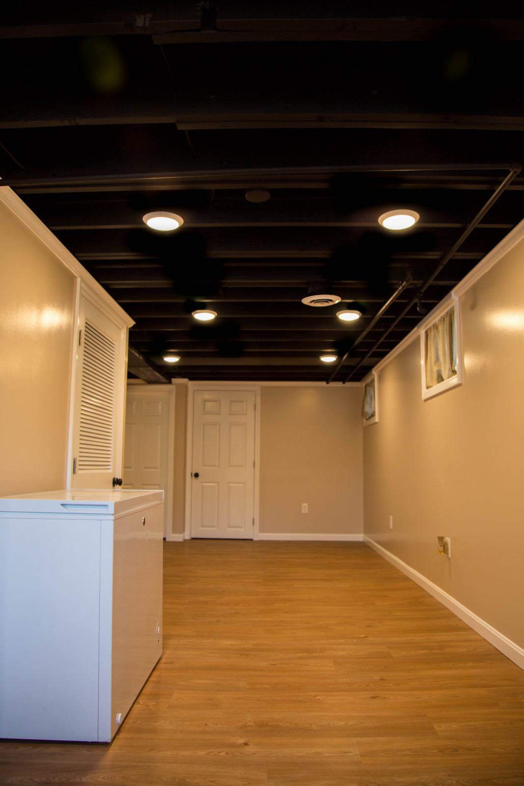 finished basement with hardwood floor