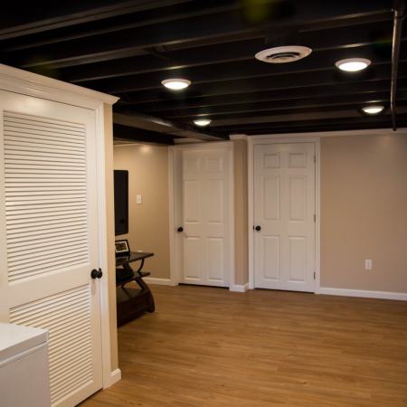 finished basement with hardwood floor