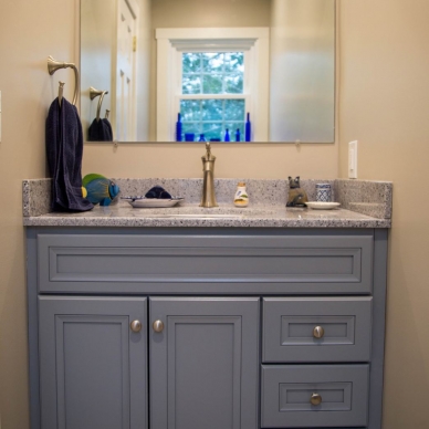 Lentz - bathroom vanity with gray cabinets and countertop