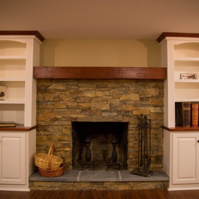 fireplace with built-in side shelving