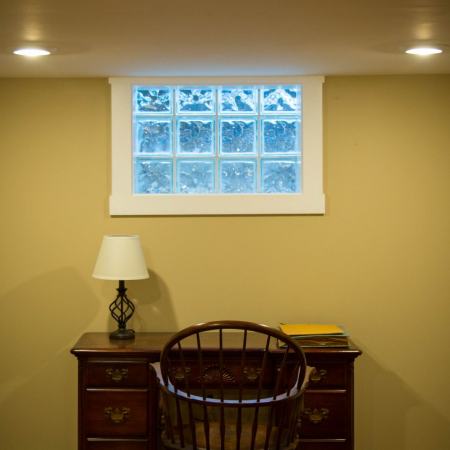 finished basement with replacement window and desk