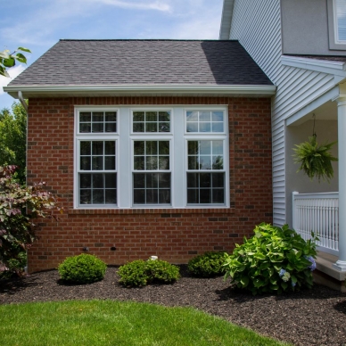 replacement windows on a brick house