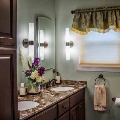 remodeled bathroom with dual vanity sinks