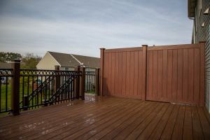 new vinyl railings and privacy fence on deck and stairs