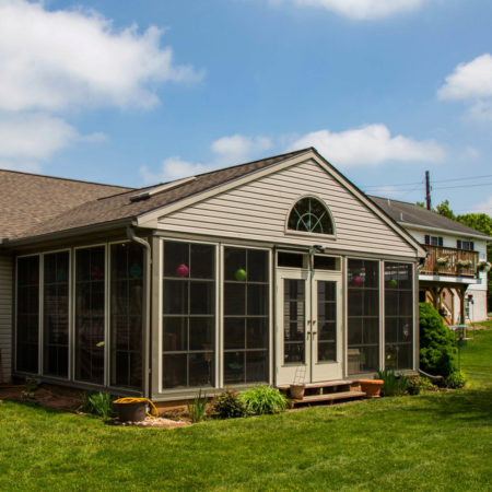 home with finished patio enclosure