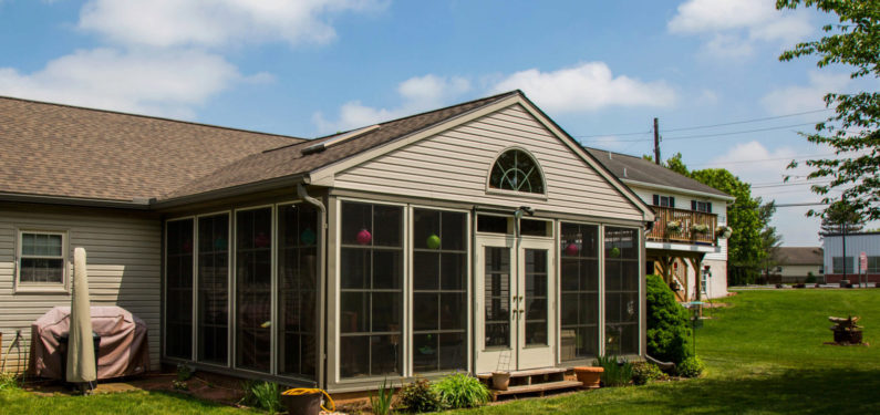 home with finished patio enclosure