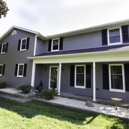 Morin - front of house with new vinyl siding