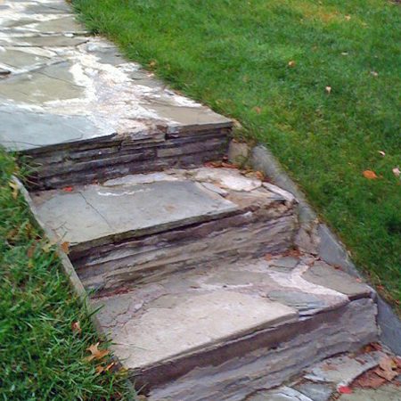cracked and weathered concrete steps