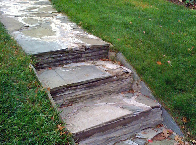 cracked and weathered concrete steps