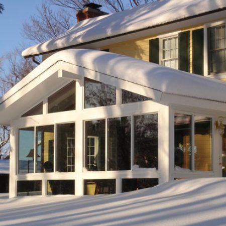 sunroom addition in snow