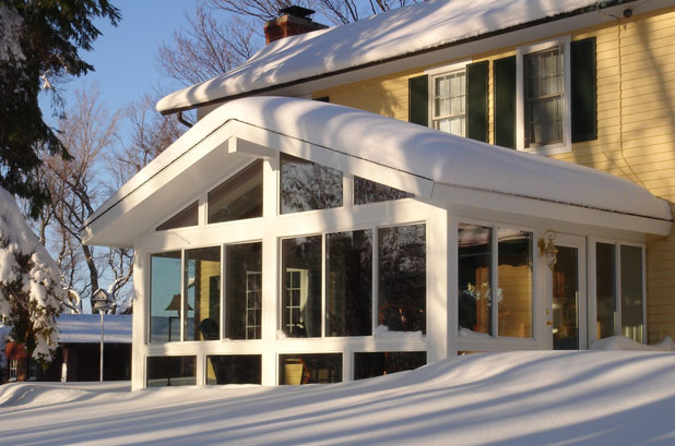 sunroom addition in snow