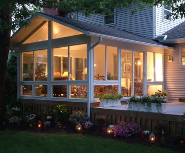 sunroom lit at dusk