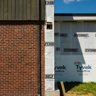 homewrap on building. prep for siding installation