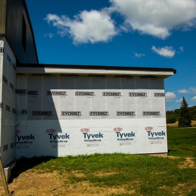 building prepped for siding installation