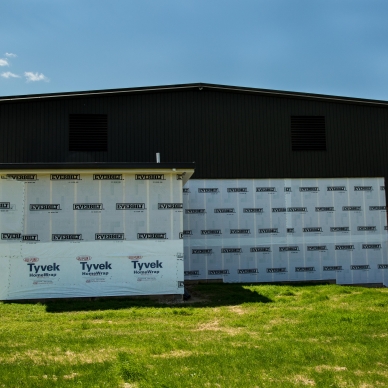 homewrap on building to prepare for siding installation