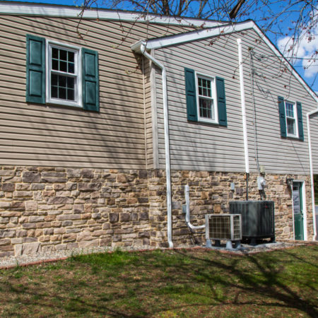 home after adding decorative stone siding