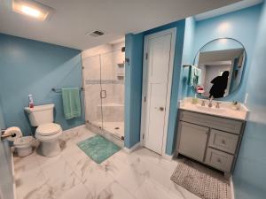 Thomas after - finished basement bathroom