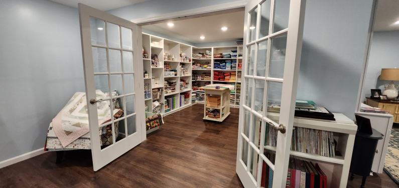 Thomas after - finished basement double doors open