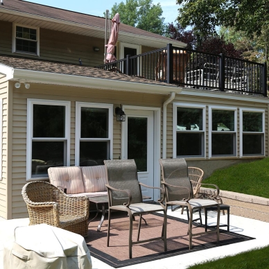 Clunnan - exterior side view of sunroom addition