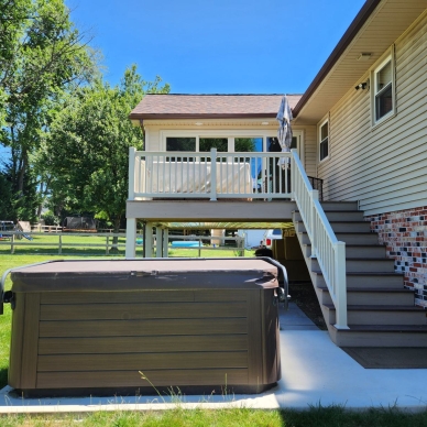 Mast - exterior view of deck and stairs leading to new addition