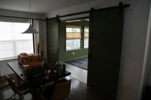 Ohara - sliding hanging door access to completed addition