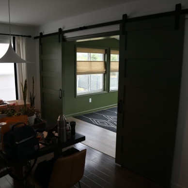 Ohara - sliding hanging door access to completed addition