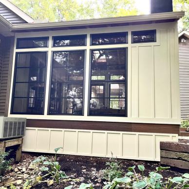 detail of windows and siding on exterior of completed vertical 4-track room addiiton