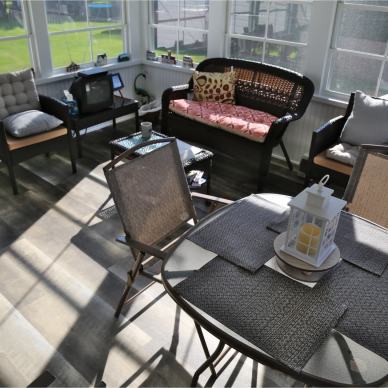 McFarland - interior of completed three-season room addition with furniture and decor
