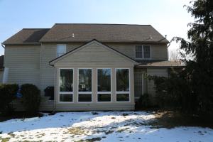 Thomas - front exterior view of completed three-season home addition