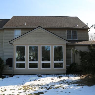 Thomas - front exterior view of completed three-season home addition
