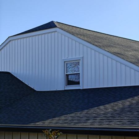 Wagner - roof repair window installation on garage, and board and batten siding added to house
