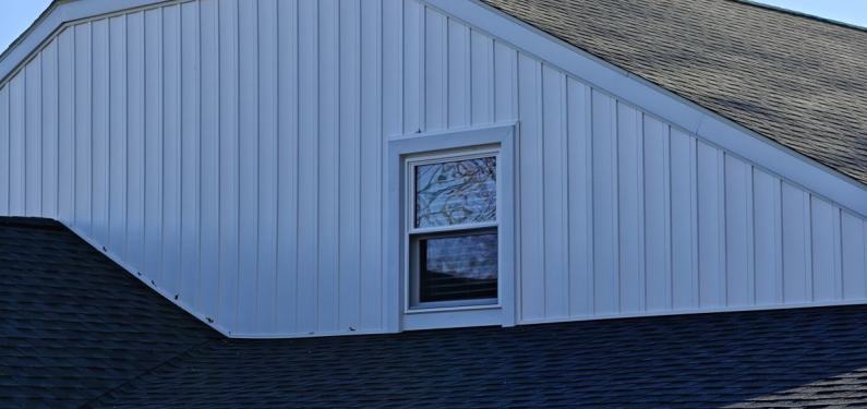 Wagner - roof repair window installation on garage, and board and batten siding added to house
