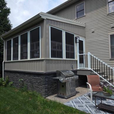 Ressler three-season addition - exterior view of addition and stairs with railing