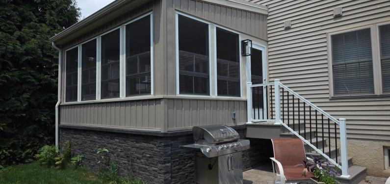 Ressler three-season addition - exterior view of addition and stairs with railing