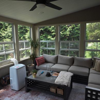 Ressler three-season addition - interior with view of couch and windows